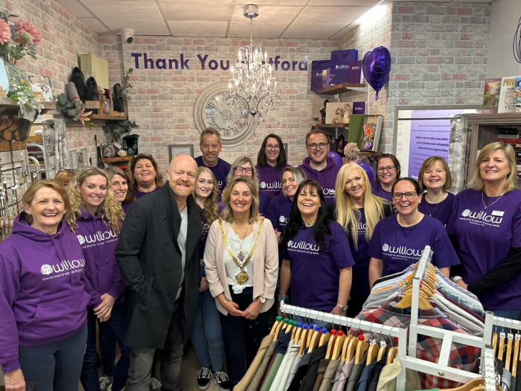 Willow staff in purple T-shirts inside new Hertford shop