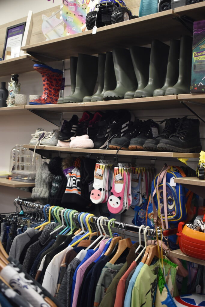 Shoes, socks and other preloved items line the shelves inside Willow Stevenage shop. 