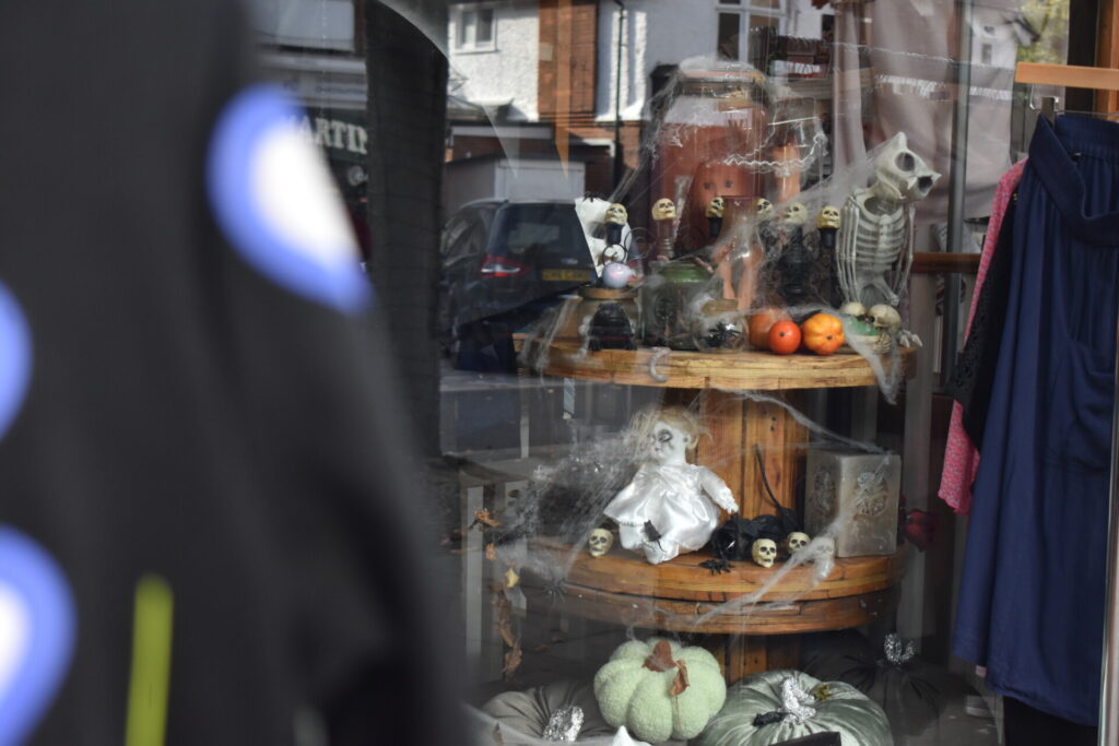 Halloween window display at Letchworth's Willow charity shop