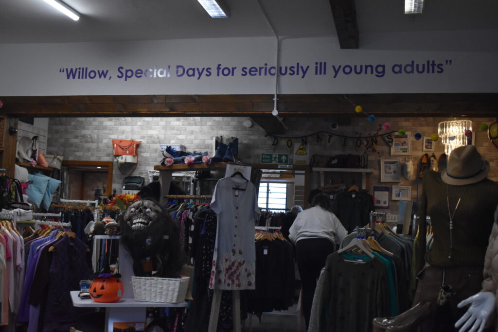 Image of the Willow charity shop floor in Letchworth from the perspective of a customer as they enter the shop. 