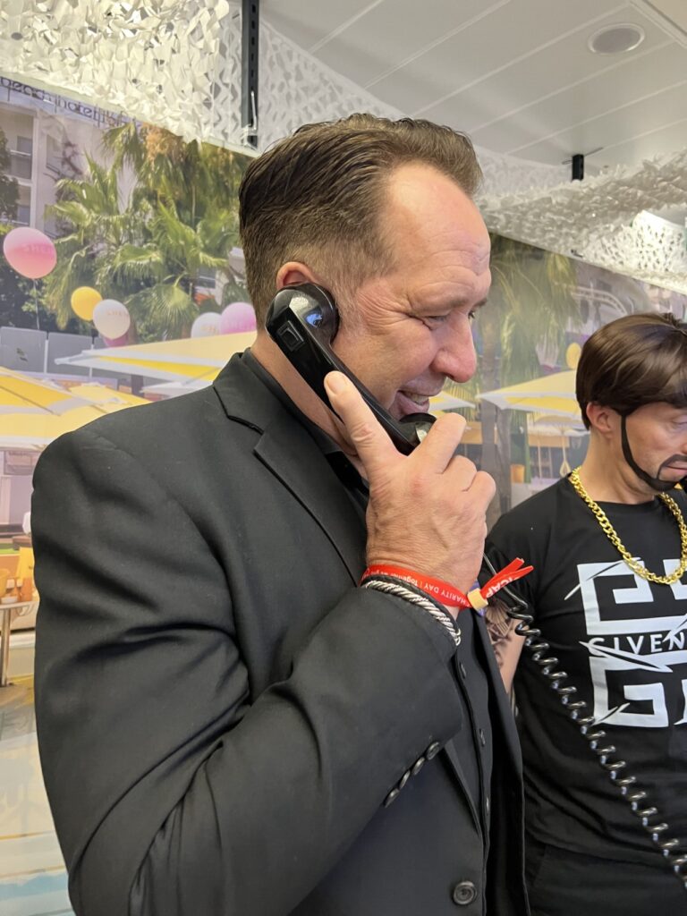 David Seaman answers the phone at ICAP Charity Day 2025