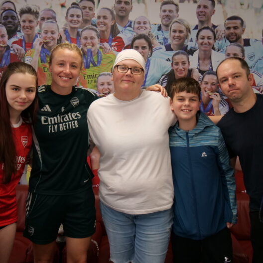 Image of Leah Williamson with Hayley, her husband and her children.